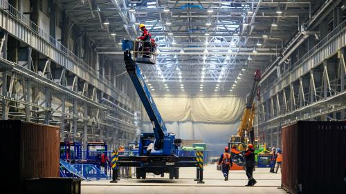 Inside a warehouse under construction